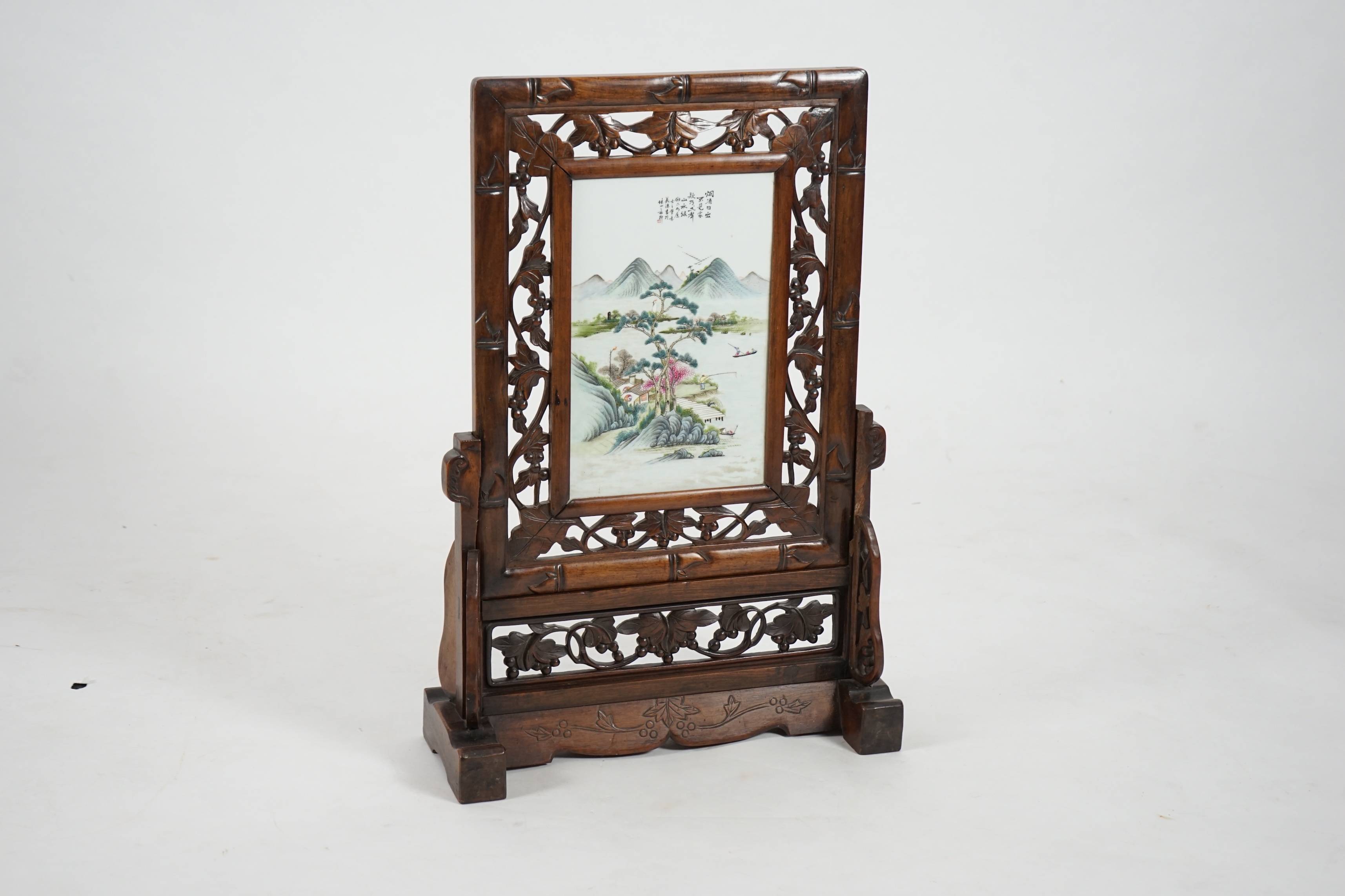 A Chinese enamelled porcelain and hongmu framed table screen, Republic period